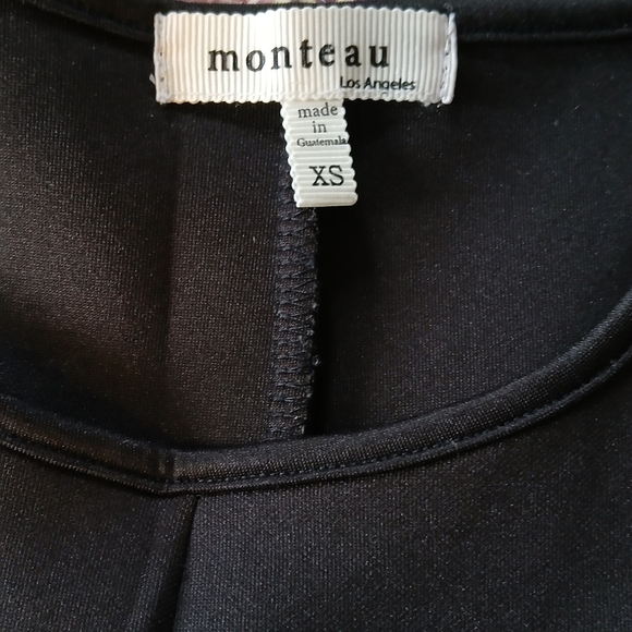 Elegant Black Sleeveless Dress - Picture 2 of 4